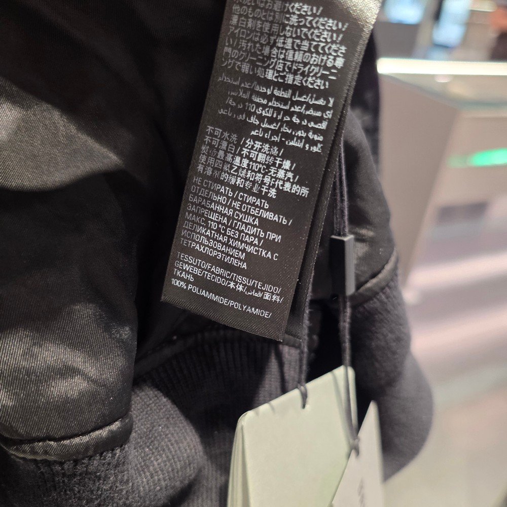 발렌시아가 폴리티칼 캠페인 로고 바시티 남성 점퍼 763434 TN027 1000